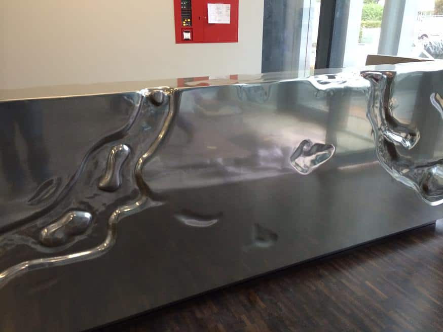 Polished VeroMetal Tin coating on a wood substrate
