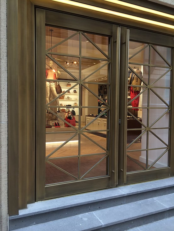 Tommy Hilfiger stores with VeroMetal Brass finish and striped patina